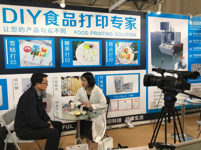 Sinojoinsun Online Food Inkjet Printer was interviewed by State media